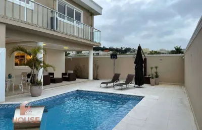 Casa com 4 dormitórios à venda, 642 m² por r$ 5.350.000,00 - condomínio verdes lagos - arujá/sp