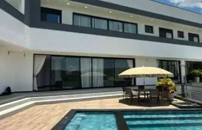 Casa com 4 dormitórios à venda, 690 m² por r$ 3.600.000 - condomínio reserva ibirapitanga - santa isabel/sp