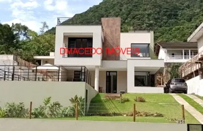 Casa em condomínio fechado com 4 quartos para alugar na rua sabiá, 851, praia da lagoinha, ubatuba por r$ 4.000 por dia