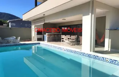 Casa em condomínio fechado com 4 quartos à venda na avenida engenho velho, 1390, praia da lagoinha, ubatuba por r$ 1.750.000