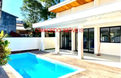 Casa em condomínio fechado com 5 quartos à venda na rua mário ferreira de sá, 43, praia da lagoinha, ubatuba por r$ 4.000.000