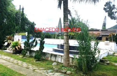 Casa com 4 quartos à venda na avenida palmeiras, 55, praia da lagoinha, ubatuba por r$ 700.000