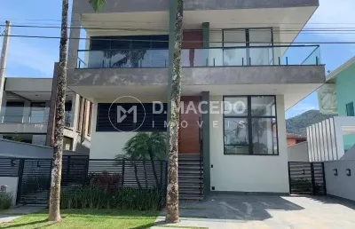 Casa em condomínio fechado com 4 quartos à venda na avenida copacabana, 218, praia da lagoinha, ubatuba, 388 m2 por r$ 4.250.000