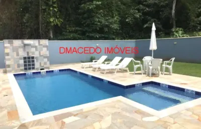 Casa em condomínio fechado com 4 quartos à venda na rua  dos cravos, 165, praia da lagoinha, ubatuba por r$ 2.000.000