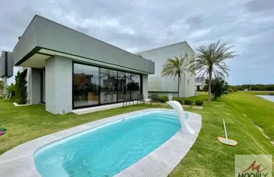 Casa mobiliada a venda em condominio reserva das aguas em torres-rs.