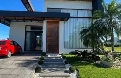Belissima casa mobiliada a venda no condominio reserva das aguas em torres-rs.