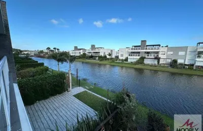 Sobrado com dois quartos, jacuzzi, frente lago, xangri-la-rs