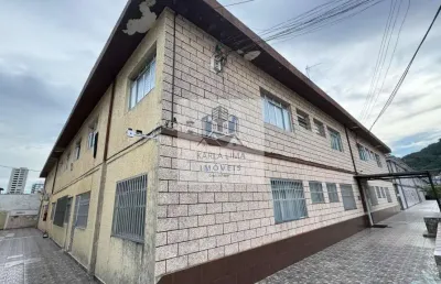Kitnet / conjugado em canto do forte  -  praia grande