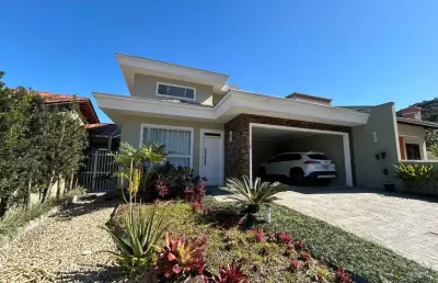 Casa em condomínio fechado com 3 quartos à venda no iririú, joinville  por r$ 1.490.000