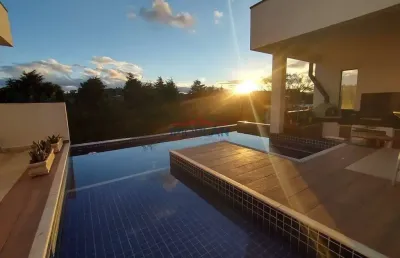 Projeto moderno e design arrojado numa casa totalmente térrea em condominio