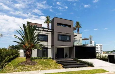 Casa com 4 dormitórios à venda, 486 m² por r$ 4.860.000 - centro - camboriú/sc