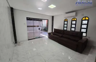 Sobrado com 3 dormitórios à venda, 180 m² por r$ 585.000,00 - vila assunção - praia grande/sp