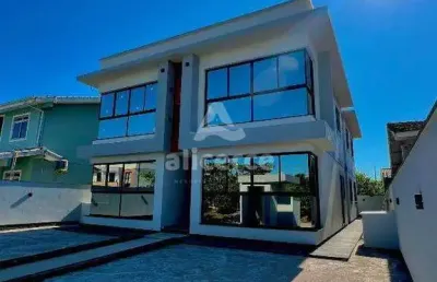 Apartamento novo de alto padrão na pinheira – viva a poucos metros da praia!