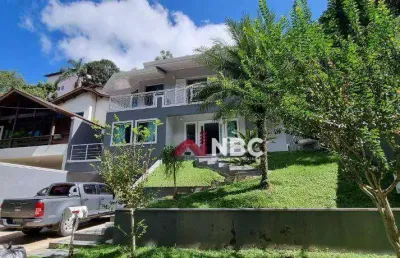 Casa com 4 dormitórios à venda, 298 m² por r$ 2.010.000,00 - condomínio country club - arujá/sp