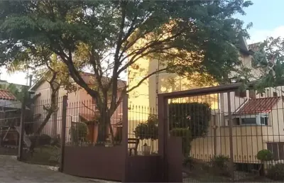 Casa em condomínio fechado com 2 quartos à venda na Rua Professor Joaquim Louzada, Cavalhada, Porto Alegre