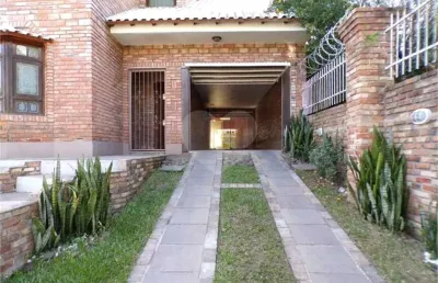 Casa com 3 quartos à venda na Rua Ramis Galvão, Passo da Areia, Porto Alegre