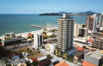 Apartamento de 2 dormitorios sendo 2 suites a 200 metros do mar no centro de balneario picarras.