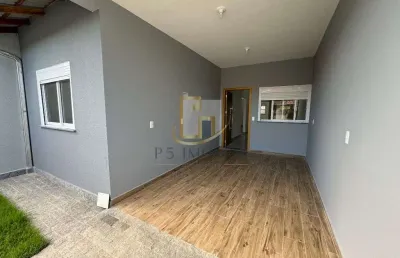 Bela casa composta por 3 dormitorios sendo 1 suite, no bairro itacolomi em balneario picarras.