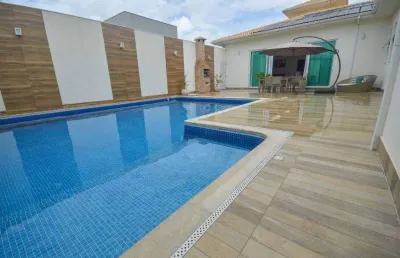 Casa de condomínio para venda possui 375 metros quadrados com 4 quartos