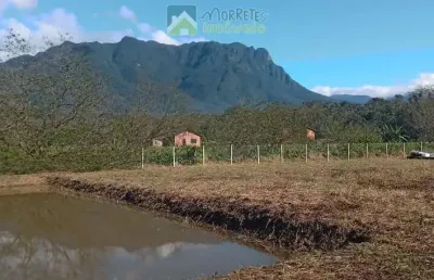 Terreno plano 5.120 metros em morretes na ponte alta  já com lago e todo cercado  com tela e portão