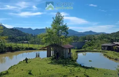 Chácara em antonina casa com piscina, vários tanques de peixe, aprisco e nascentes