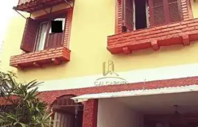 Sobrado com 3 dormitórios à venda, 242 m² por r$ 490.000,00 - jardim algarve - alvorada/rs