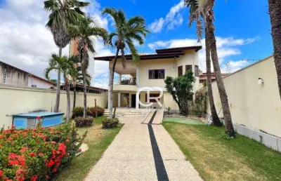 Casa com 5 suítes, fundo correspondente, piscina, deck, ótima localização à venda - engenheiro luciano cavalcante - fortaleza/ce