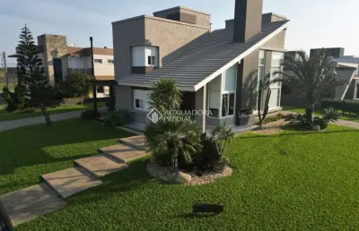 Casa em condomínio fechado com 4 quartos à venda na do mar, 3300, condomínio lagoa do passo, osório, 247 m2 por r$ 2.700.000