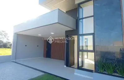 Casa com 3 quartos à venda na josué guimarães, 600, panorâmico, osório, 130 m2 por r$ 950.000