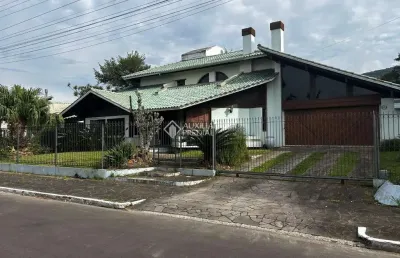 Casa com 4 quartos à venda na leôncio luís marques, 585, caiu do céu, osório, 300 m2 por r$ 1.250.000