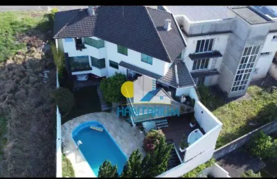 Casa com 5 dormitórios, 6 vagas, 590 m² - tarumã - curitiba/pr