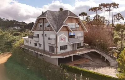 Casa em condomínio fechado com 6 quartos à venda no colinas capivari, campos do jordão  por r$ 6.900.000