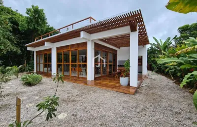 Casa em condomínio fechado com 4 quartos à venda na praia do itamambuca, ubatuba  por r$ 3.600.000
