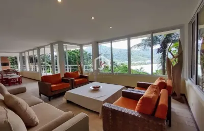 Casa em condomínio fechado com 5 quartos à venda em toninhas, ubatuba  por r$ 3.250.000