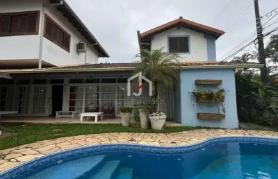 Casa com 4 quartos à venda em itaguá, ubatuba  por r$ 1.690.000
