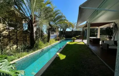 Casa em condomínio fechado com 4 quartos à venda na rodovia haroldo soares glavan, 3820, cacupé, florianópolis por r$ 7.058.000