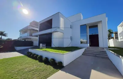 Casa com 4 quartos à venda na avenida dos búzios, 2680, jurerê internacional, florianópolis por r$ 7.750.000