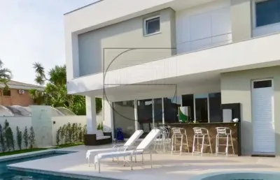 Casa com 5 quartos à venda na avenida dos búzios, 1931, jurerê internacional, florianópolis por r$ 7.200.000