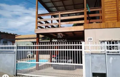 Sobrado com 5 quartos sendo 3 suítes e com piscina para venda em barra velha - sc