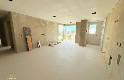 Apartamento em construção, com 2 suítes, à apenas 240m do mar, à venda por r$ 63