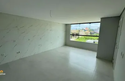Apartamento com dois dormitórios, sendo uma suíte, no centro de penha sc! à vend