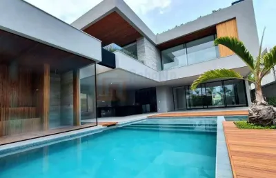 Primeira locação magnífica casa à venda condomínio alphaville barra da tijuca 1100m² área útil terreno de 900m²  5 suítes piscina sauna varanda goumet