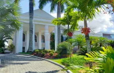 Magnífica casa à venda no condomínio mansões de 1500m² com 4 suítes ampla área de lazer com piscina sauna e sala de cinema
