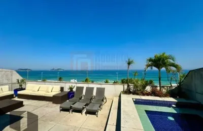 Magnífica cobertura frente mar à venda na barra da tijuca de 920m² com 5 suítes sala ampla 4 ambientes terraço cinema 5 vagas de garagem piscina