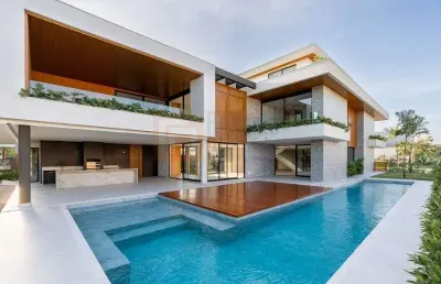 Pronta para morar! magnífica casa à venda condomínio alphaville 995m² área útil terreno de 980m² 5 suítes piscina sauna varanda gourmet churrasqueira
