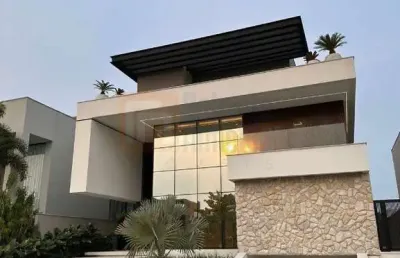 Pronta para morar! magnífica casa à venda condomínio alphaville 904m² área útil terreno de 622m² 5 suítes piscina sauna varanda gourmet churrasqueira