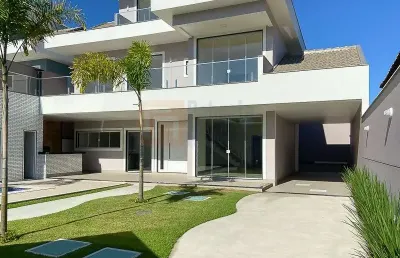 Casa nova e pronta para morar! linda casa condomínio jeribá em vargem grande de 374m² área útil e terreno com 360m² com 3 suítes piscina sauna 3 vagas
