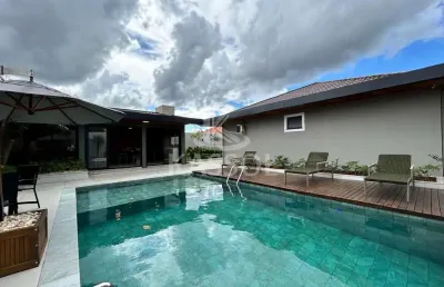 Casa térrea no country com 2 suites e 2 quartos piscina espaço gourmet