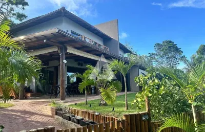 Casa na praia do forte porteira fechada com 3 quartos e 2 suítes, 159m² à venda por r$ 1.280.000,