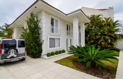 Casa com 4 quartos para alugar na Avenida Senador Salgado Filho, 5135, Uberaba, Curitiba